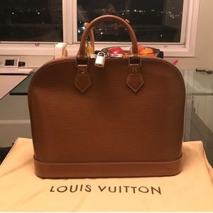 Louie Vuitton alma epi leather satchel